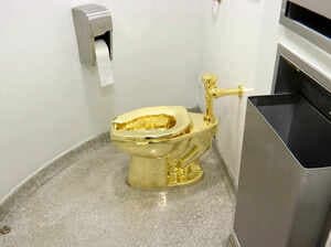 Maurizio Cattelan's Solid Gold Toilet Sculpture 'America' Goes Up for Auction